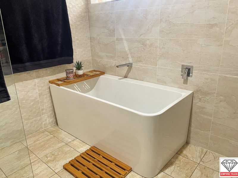 Bathroom Bathroom featuring tones with and soft lighting.