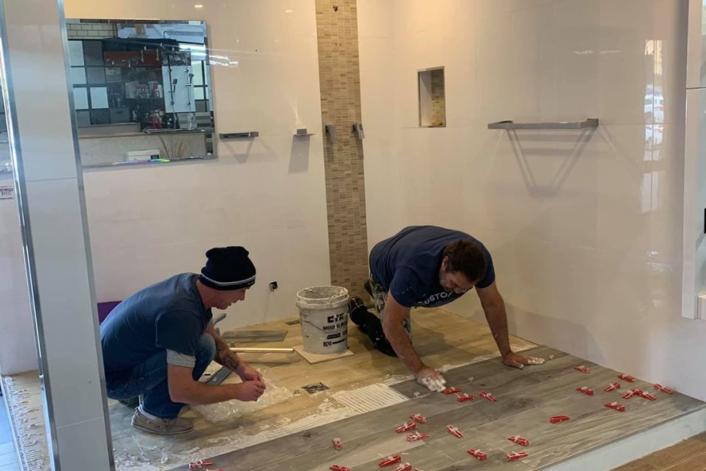 Empire Tiles contractor performing site assessment for a bathroom renovation in a Sydney home